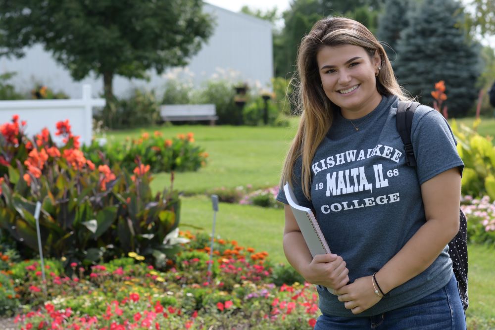 Kishwaukee College Student Smiling in a summer scene