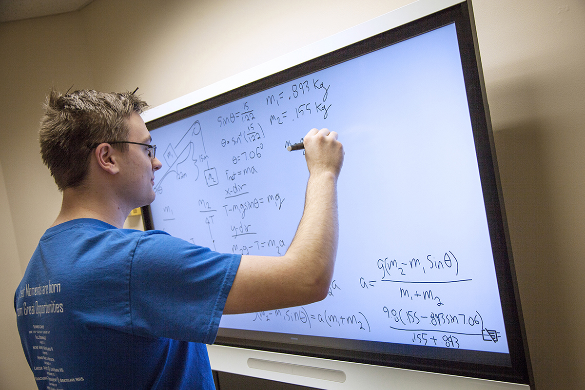 Student Working at a Smart Board