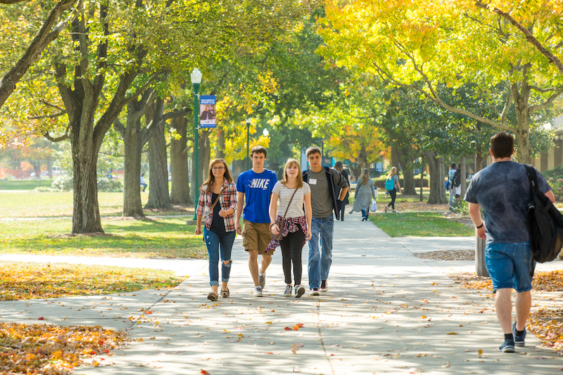 Students walking in Fall Scene on EIU campus