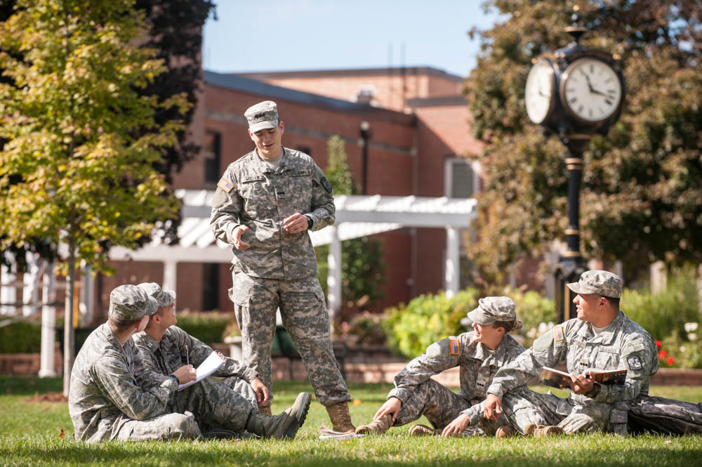 Military/ROTC students in uniform outdoors on Lewis University campus