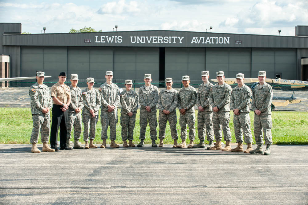 Lewis University Military/ROTC student in front of Aviation Center